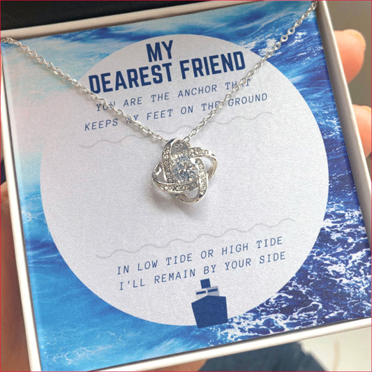 Blue Circle-Friendship CZ Love Knot Pendant, Gift boxed with meaningful message card which reads:  "My Dearest Friend, You are the anchor that keeps my feet on the ground, In low tide or high tide I"ll remain by your side."