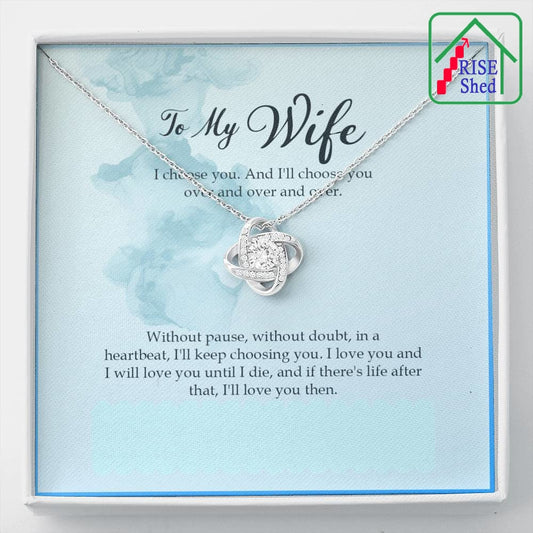 To My Wife, I choose you Love Knot Necklace is lying in it's gift box with Built in Greeting card. Card has a space below where you can handwrite your own closing sign off to personalize your gift. 