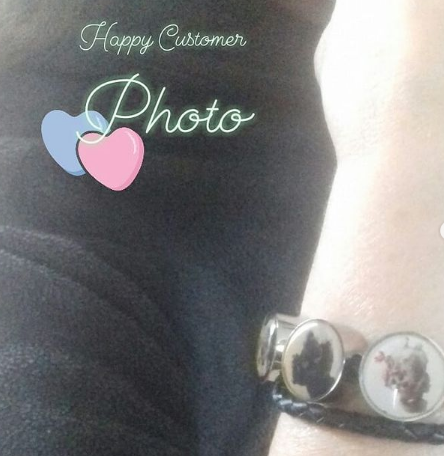 Happy Customer Photo showing 3 personalized pet photo charm pendants on a bangle.