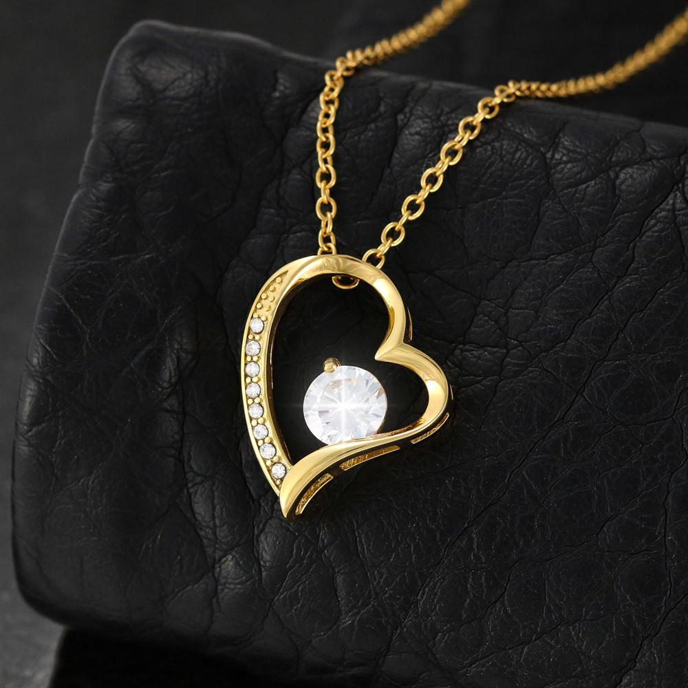 Get Unique Cubic Zirconia White And Yellow Gold Pendants For Your Loved One
