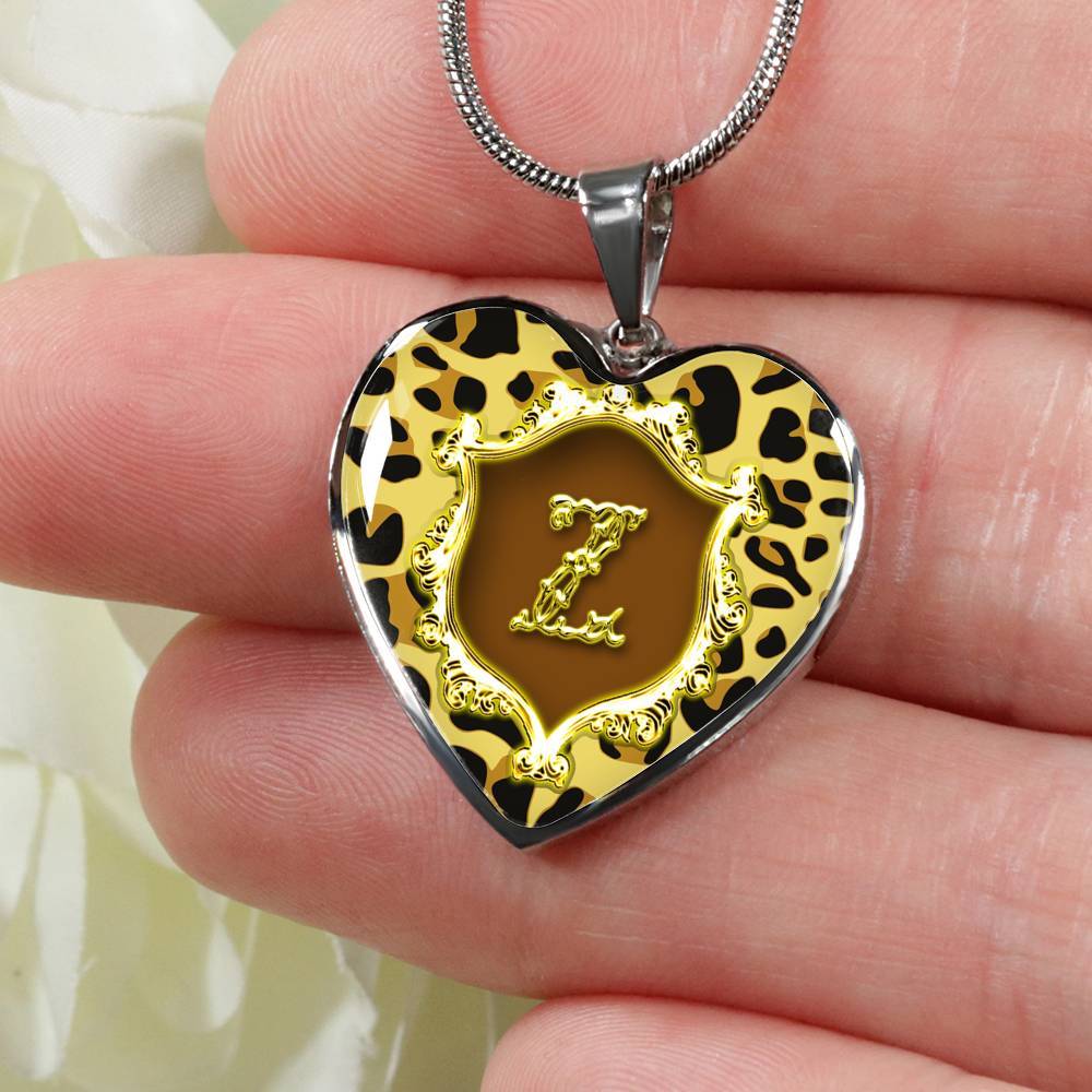 Close up of Z Initial Monogram Alphabet Heart Pendant and Necklace being held in hand
