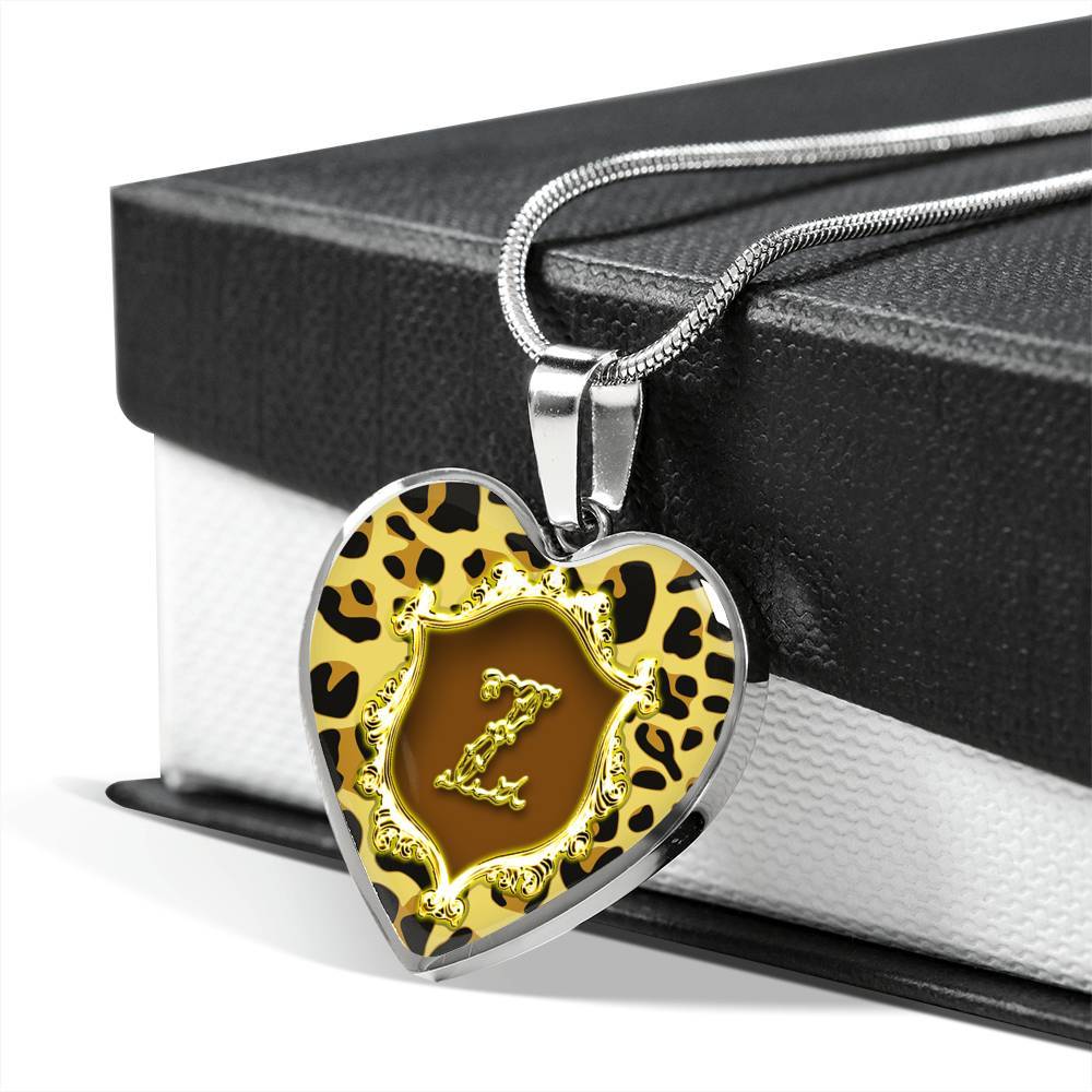 Z Initial Monogram Alphabet Stainless Steel Heart Pendant and Necklace draped over giftbox