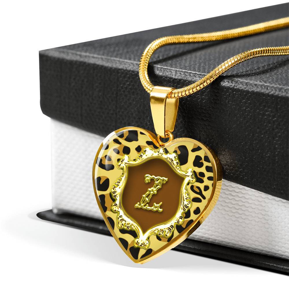 Z Initial Monogram Alphabet 18k Gold Finish Heart Pendant and Necklace draped over gift box
