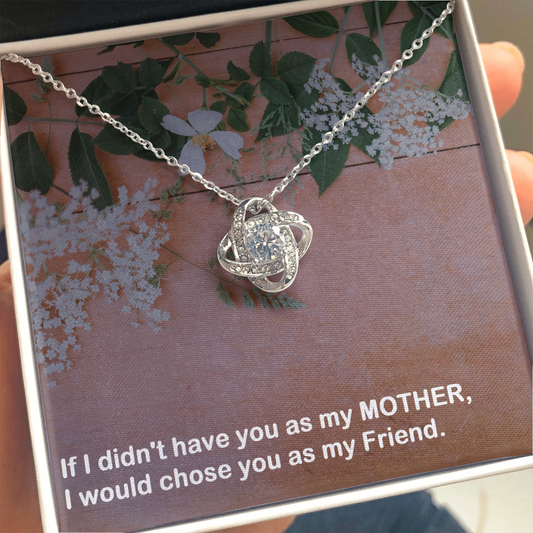 Mother I Choose As A Friend CZ Love Knot Pendant with message greeting card which reads,"If I didn't have you as my MOTHER, I would chose you as my Friend." on a floral background