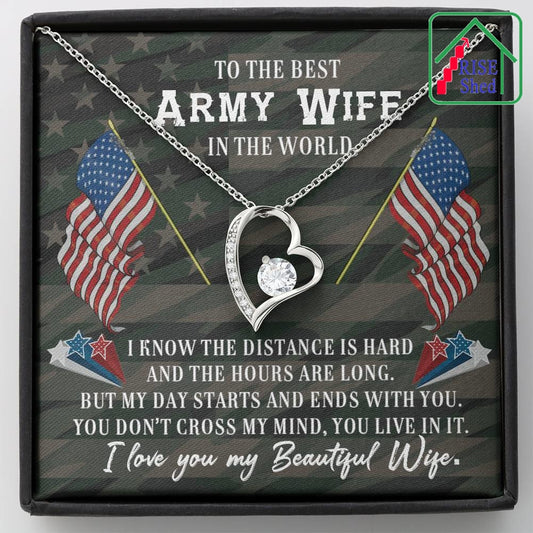 To The Best Army Wife In The World, I know the distance is hard and the hours are long. But my day starts and ends with you. You don't cross my mind, you live in it. I love you my Beautiful Wife. Message Greeting Card sits inside the gift box decorated with two USA flags, sitting under the White gold and cubic zirconia heart pendant on a cable chain necklace.
