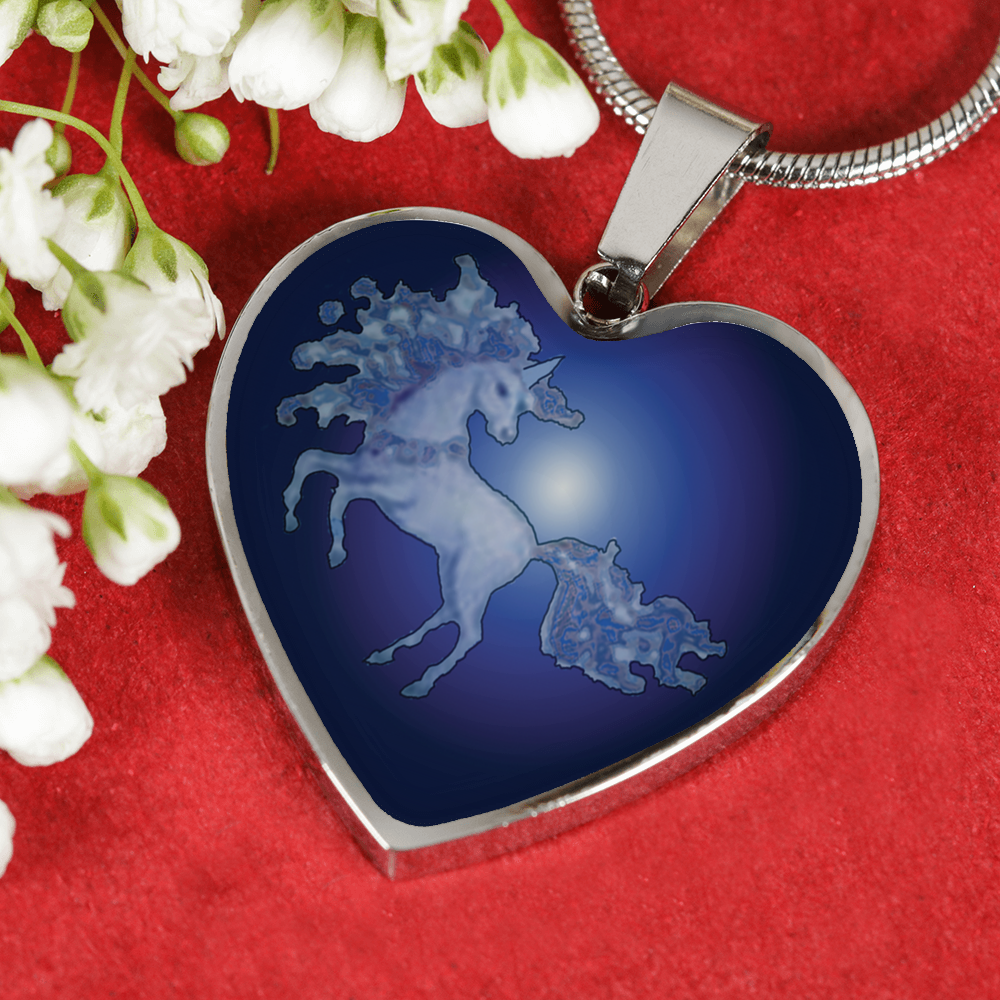 This unicorn is dancing at midnight in the moonlight of the full moon on a heart shaped pendant