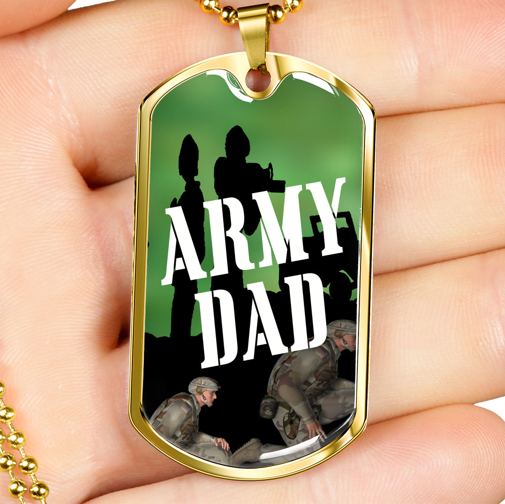Army Dad Dog Tag with gold finish rests against palm of hand