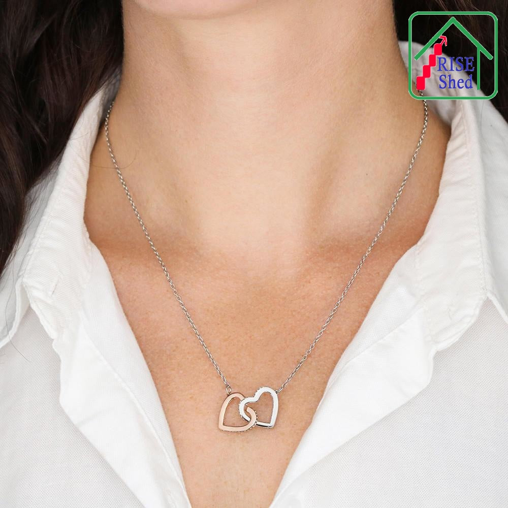 The Together Forever Linked Hearts Necklace being worn by model