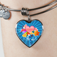 Close up of Heart Rays Of Love Charm Pendant on Bangle on wrist