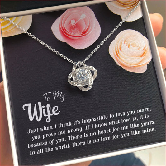 To my Wife-Just when I think CZ Love Knot Pendant if presented in a gift box with a sentimental message card, which reads:  "To My Wife, Just when I think it's impossible to love you more, you prove me wrong. If I know what love is, it is because of you. There is no heart for me like yours. In all the world, there is no love for you like mine."